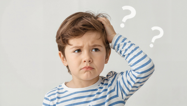 急速拡大装置で顔に変化があるのか考える子ども